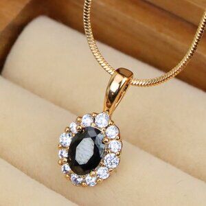 "Black Oval Pendant with Sparkling Halo in Gold-Plated Brass Setting, XPPT1814